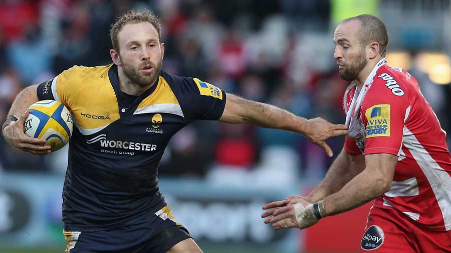 Worcester's Chris Pennell tries to get past Charlie Sharples