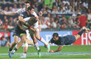 Dan Bibby of England is tackled 