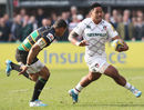 Leicester's Manu Tuilagi tries to evade Luther Burrell