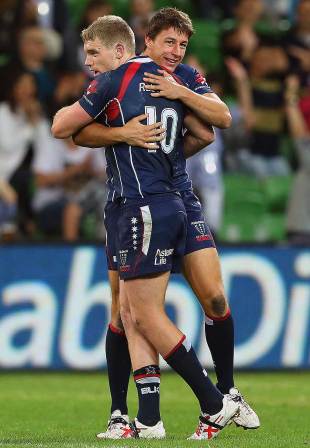 The Rebels' Bryce Hegarty and Luke Burgess celebrate victory, Melbourne Rebels v Brumbies, Super Rugby, AAMI Park, Melbourne, March 28, 2014