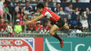 Kosuke Hashino drops the ball as he dives across the line