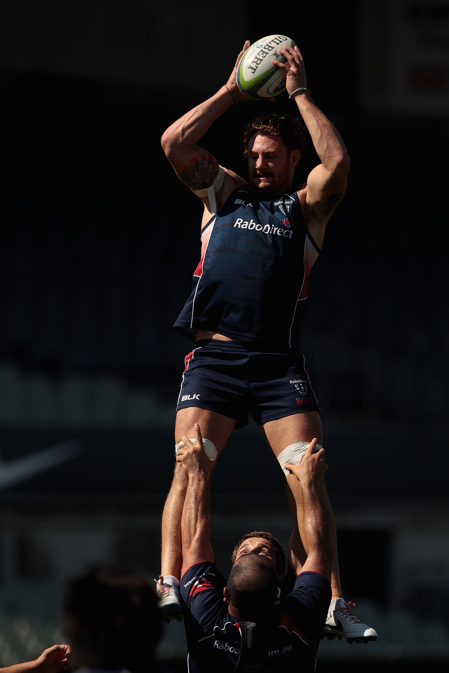 Scott Higginbotham takes a lineout throw at training