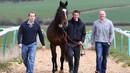 James Simpson-Daniel, trainer Michael Scudamore and Mike Tindall stand alongside their horse Monbeg Dude