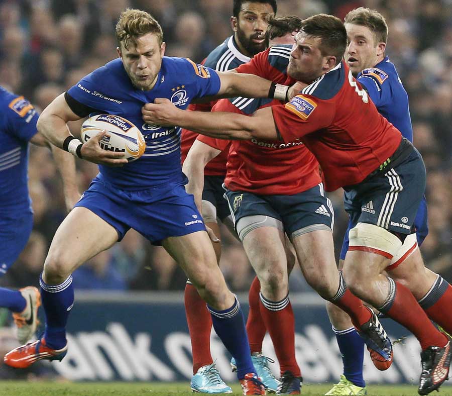 Leinster's Ian Madigan tries to break away from the Munster defence