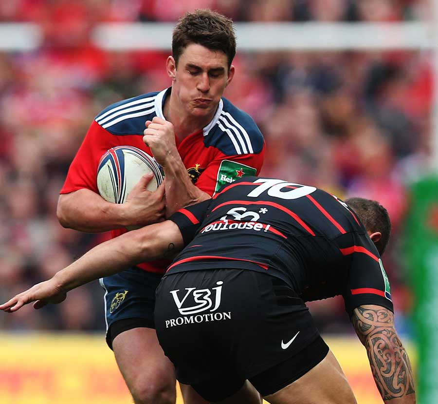 Munster's Ian Keatley takes the game to Toulouse's Luke McAlister