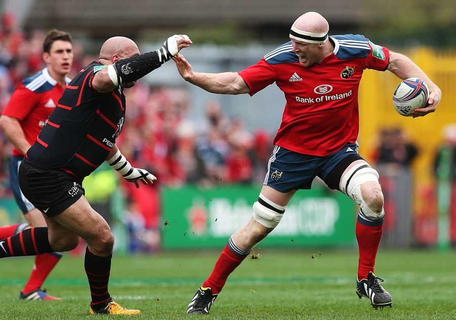 Munster's Paul O'Connell attempts to hand-off Gurthro Steenkamp
