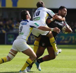 Morgan Parra and Brock James try to bring down Manu Tuilagi, Clermont Auvergne v Leicester Tigers, Heineken Cup, Stade Marcel Michelin, Clermont-Ferrand, April 5, 2014