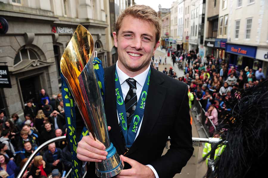 Exeter skipper Dean Mumm shows off the LV= Cup on their bus parade