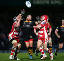 Wasps' Andy Goode is put under pressure by Gloucester