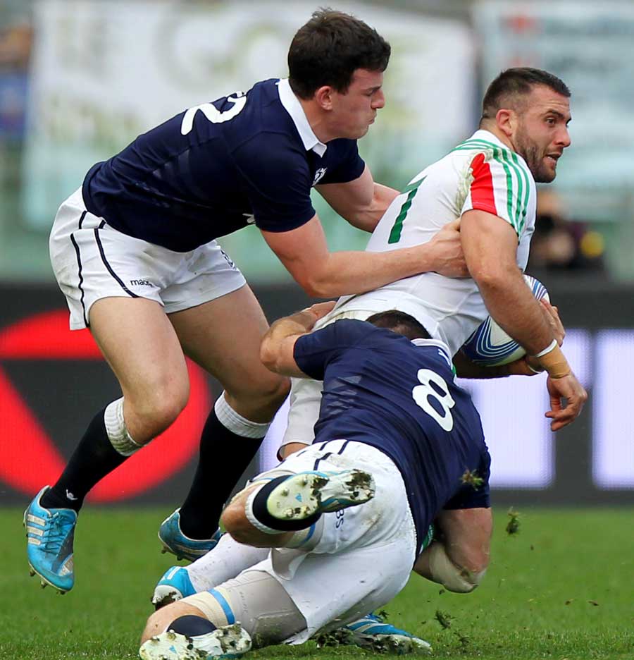 Italy's Robert Barbieri carries forward against Scotland