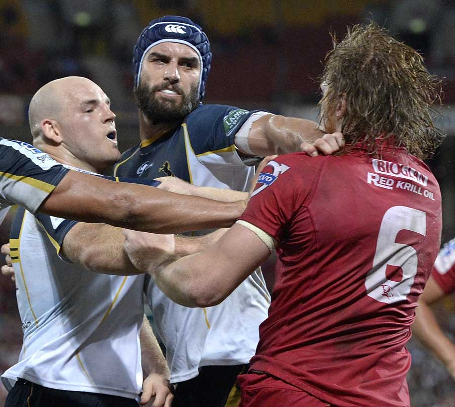 The Brumbies' Stephen Moore and the Reds' Eddie Quirk get to know each other