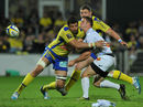 Rory Kockott is stopped by Clermont's Damien Chouly