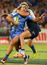 Western Force winger Nick Cummins is taken high by Adam Ashley-Cooper of the New South Wales Waratahs