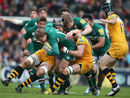 Mathew Tait is tackled by Tom Palmer and Guy Thompson 