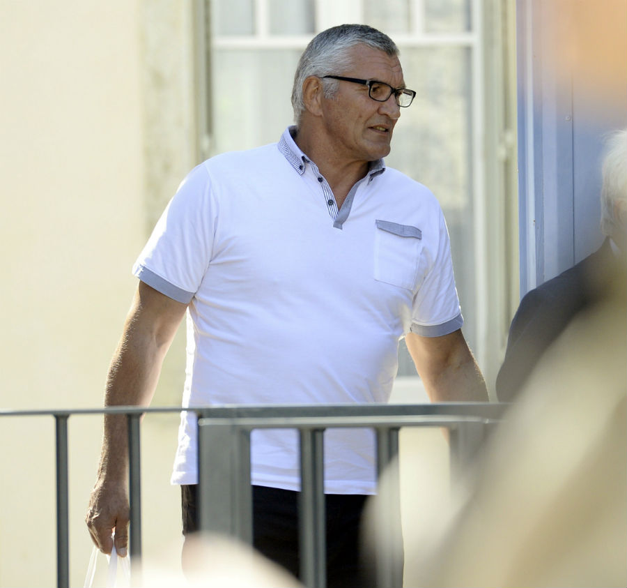 A rare sight of Marc Cecillon, former French rugby union player convicted of murdering his wife in 2004, as he arrives at the court in Bourgoin-Jallieu