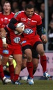 Toulon's Bryan Habana clutches his leg as he suffers an injury against Exeter Chiefs