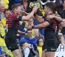 Saracens' Chris Ashton is congratulated on his try