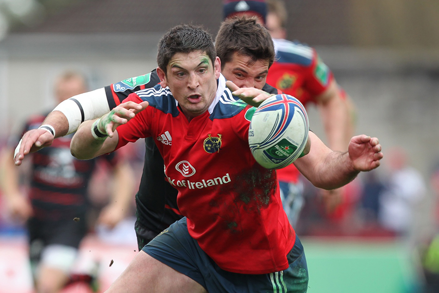 Munster's James Downey is put under pressure by Florian Fritz of Toulouse