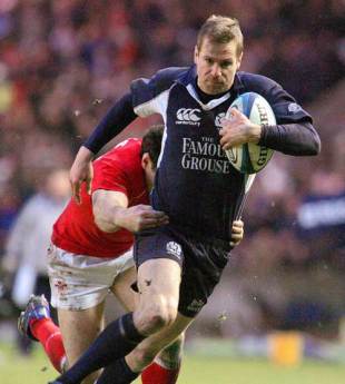 Scotland's Chris Paterson evades the Wales defence