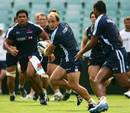 Phil Waugh looks to pass during a Waratahs training session