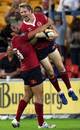 The Reds' Peter Hynes celebrates scoring a try
