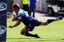 The Blues' Jimmy Gopperth dives over to score a try