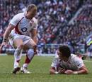 Harry Ellis dives in to score England's second try