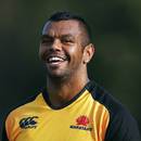 Kurtley Beale smiles during a New South Wales Waratahs training session