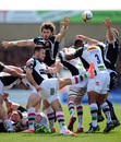 Harlequins' Danny Care puts in a box kick against Exeter