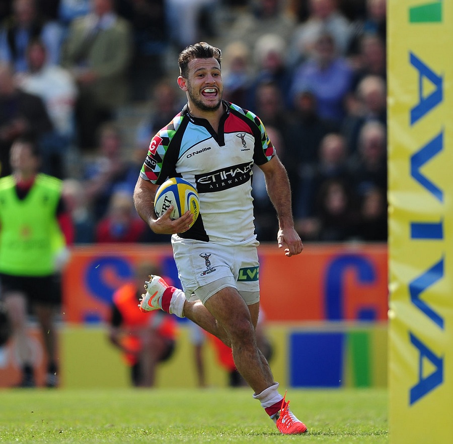 Danny Care looks delighted with his afternoon's work as he runs in a try against Exeter
