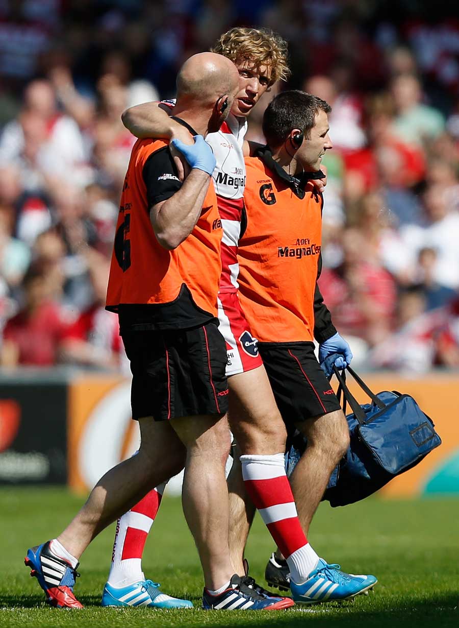 Gloucester's Billy Twelvetrees is carried off 