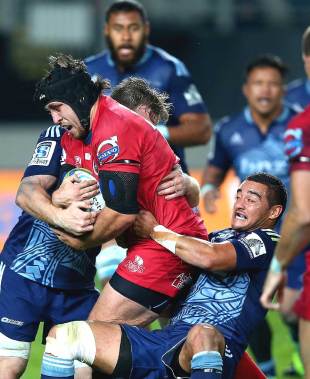 Ben Daley of the Reds is tackled by Bryn Hall, Blues v Queensland Reds, Super Rugby, Eden Park, Auckland, May 2, 2014
