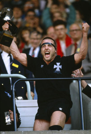 Neath's Kevin Phillips shows his excitement as he celebrates with the trophy, Llanelli v Neath, Cardiff, May 6, 1989