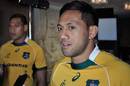 Christian Leali'ifano and Israel Folau talk at the launch of the Wallabies jumper