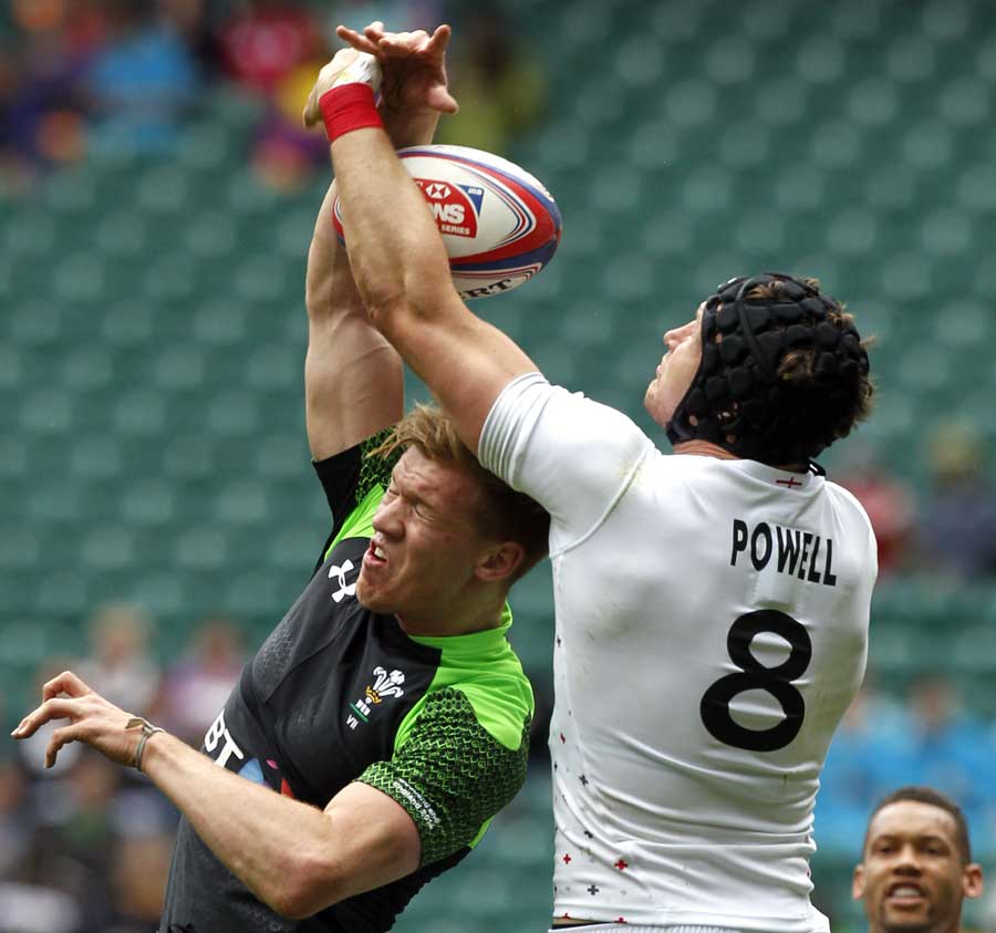 England's Tom Powell vies for the ball during the London Sevens