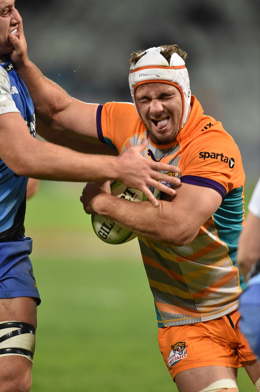 The Cheetahs' Heinrich Brussow prepares to take a hit, Toyota Cheetahs v Western Force, Super Rugby, Vodacom Park, May 10, 2014