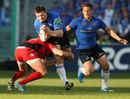 Leinster's Brian O'Driscoll is tackled by Toulon's Matt Giteau