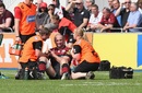 Steve Borthwick receives treatment for a chest injury