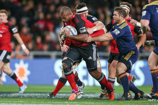 Nemani Nadolo of the Crusaders is wrapped up in a two-man tackle, Highlanders v Crusaders, Super Rugby, Forsyth Barr Stadium, Dunedin, May 24, 2014