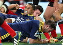 Highlanders' Ged Robinson crashes over for a try