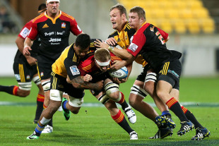 Chiefs' flanker Sam Cane is wrapped up in a tackle, Hurricanes v Chiefs, Super Rugby, Westpac Stadium, Wellington, May 24, 2014