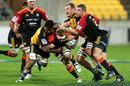 Chiefs' flanker Sam Cane is wrapped up in a tackle