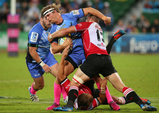 Western Force's winger Nick Cummins attempts to break through a tackle, Force v Lions, Super Rugby, nib Stadium, Perth, May24, 2014