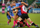 Western Force's winger Nick Cummins attempts to break through a tackle