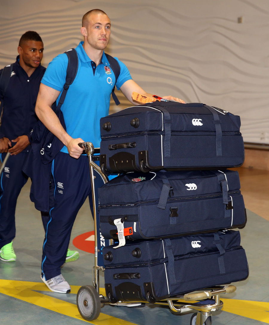 Mike Brown trudges through the airport