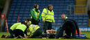 Ryan Jones receives treatment before being stretchered off