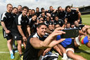 The Barbarians break off from training for a selfie