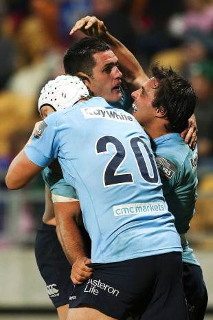 The Waratahs' Stephen Hoiles and Nick Phipps congratulate Dave Dennis, Chiefs v New South Wales Waratahs, Yarrow Stadium, New Plymouth, May 31, 2014