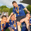 Brian O'Driscoll is held aloft by Leinster team-mates Jimmy Gopperth, Ian Madigan and Cian Healy