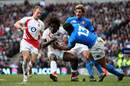 Paul Sackey is tackled by Gonzalo Canale